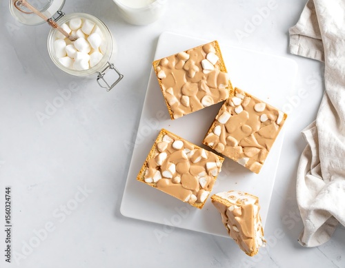 Delicious fluffernutter sandwich halves on a white cutting board with a clean backdrop showcasing creamy texture and inviting presentation