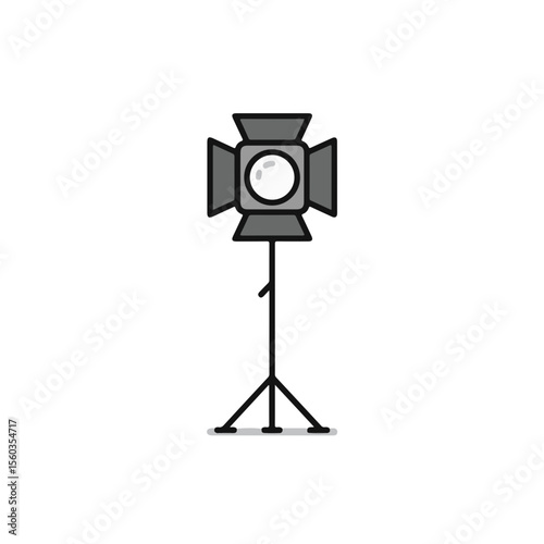 Studio lighting equipment on a tripod stand.