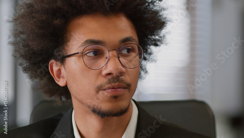 Canvas Print Portrait pensive thoughtful African American man male business dreaming face in
