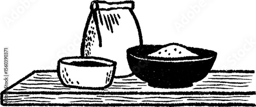Rustic kitchen prep surface with open flour bag and bowls