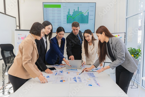 Teamwork is achieving greatness together, group of business colleagues having a brainstorming meeting in a new business startup meeting in a modern office.
