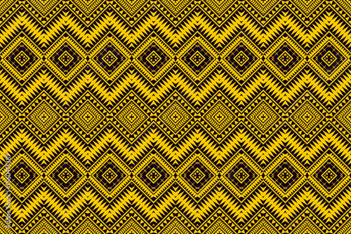 Traditional seamless geometric pattern in yellow and black with tribal diamond motifs.