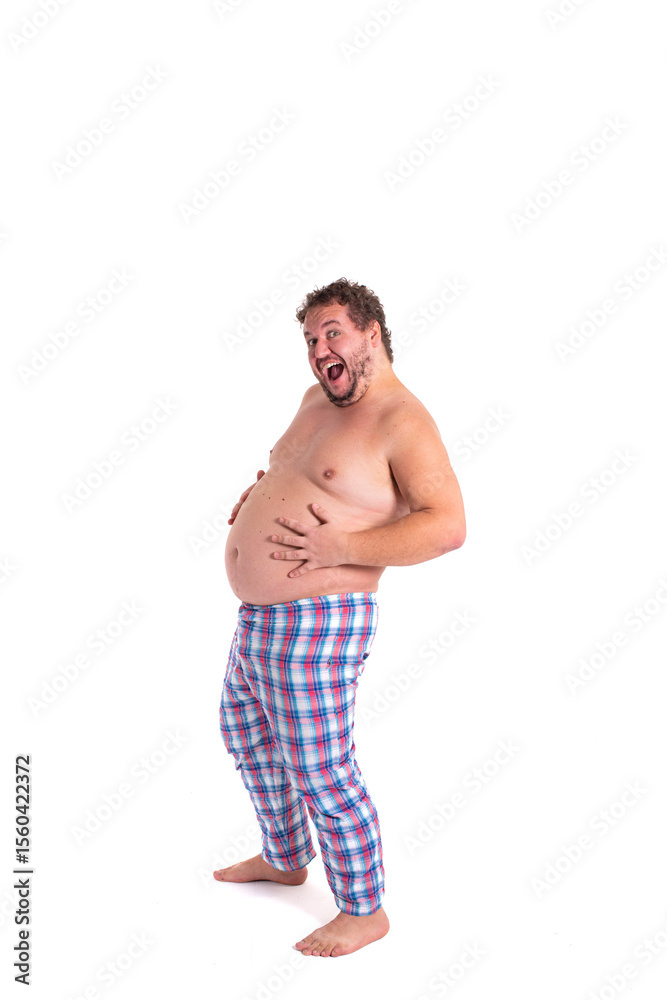 Fototapeta premium Funny fat man in pajamas early in the morning. White background.
