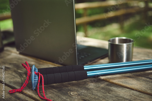 Outdoor Equipment on Wooden Table in Nature Setting With Camping Vibes