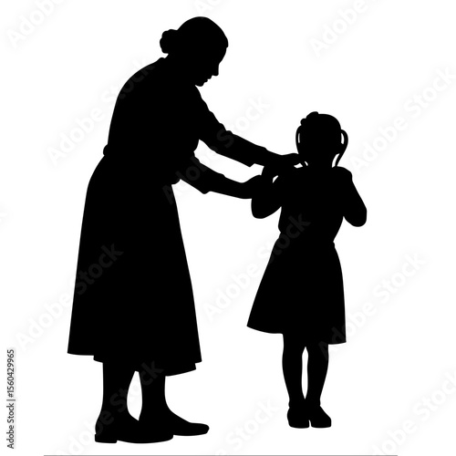 Silhouette of grandmother helping young girl with hair in profile  