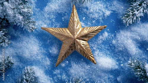 Wallpaper Mural Golden Star Christmas Ornament on Snowy Blue. Torontodigital.ca