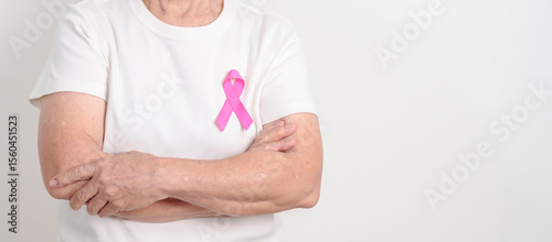 Wallpaper Mural Elderly woman with pink Ribbon for Pink October Breast Cancer Awareness month, May Women Health, August World Breastfeeding week, Nursing Mothers, Pregnancy and Infant Loss Remembrance, Stillbirth Torontodigital.ca