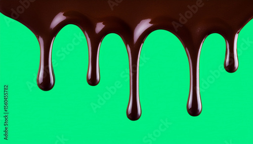 dark chocolate dripping on green screen background until full covered