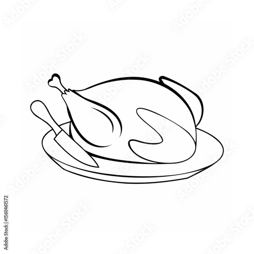 Of a roasted chicken on a plate with a knife ready for carving food