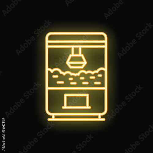 Yellow neon sign of a claw crane arcade game glowing on a black background