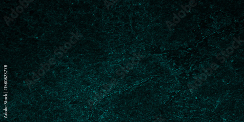 Green background with grunge scattered dots and dust particles on the blue paint wall texture. raster file of wall surface or natural material. green grunge old texture panorama backdrop background. 