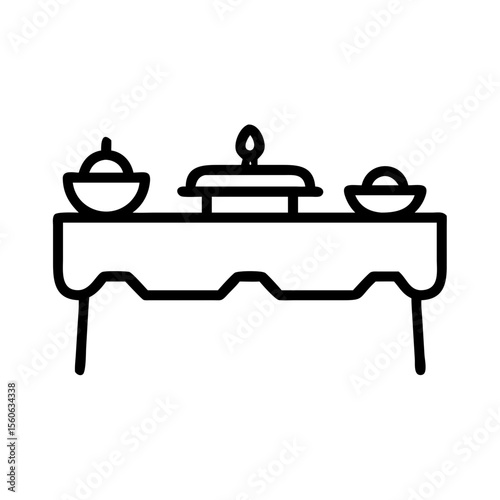 Buffet table setup with dishes and candle for dining concept  
