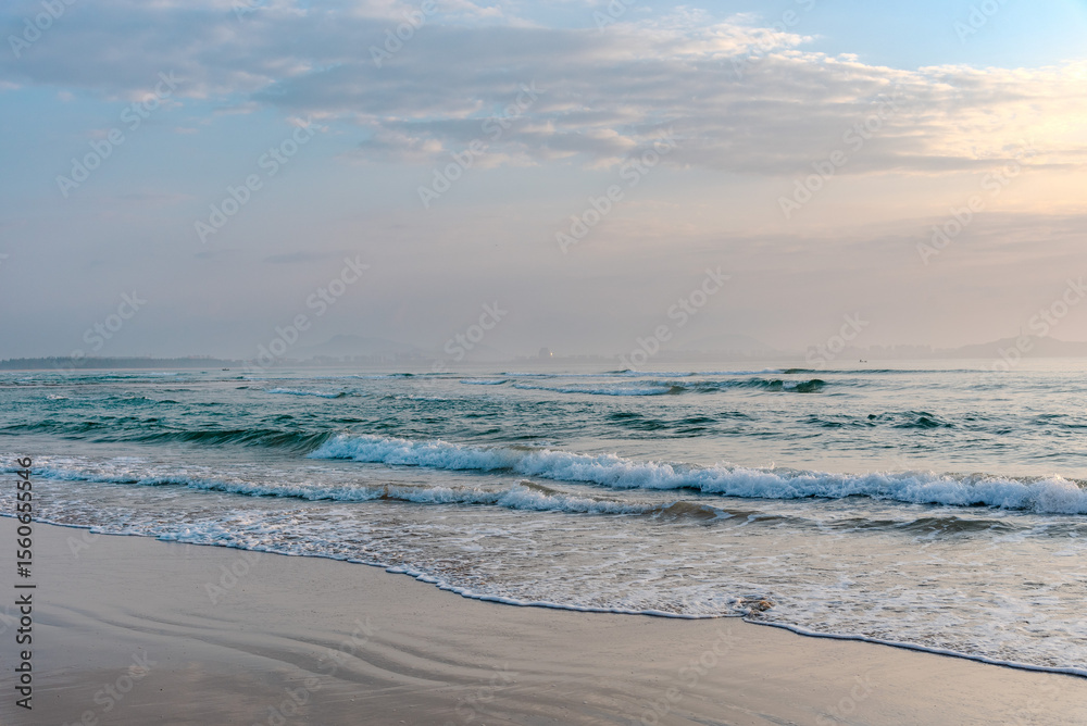 Fototapeta premium China sanya sunrise beach in China cityscape view.