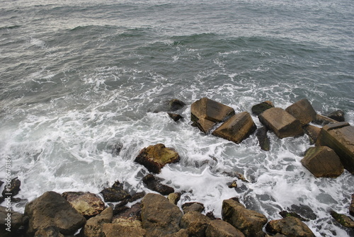waves crashing on rocks