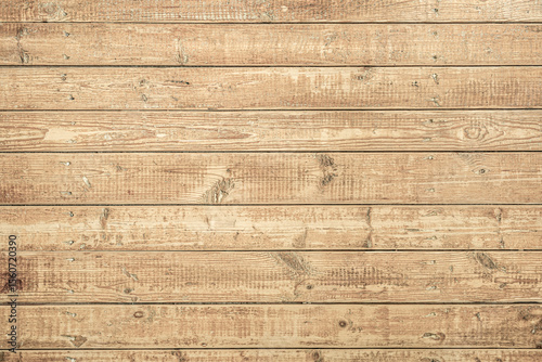 Rustic wooden texture with natural grain patterns creates a warm and inviting atmosphere.