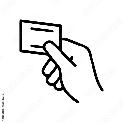 Hand holding credit card for insertion into ATM machine concept  