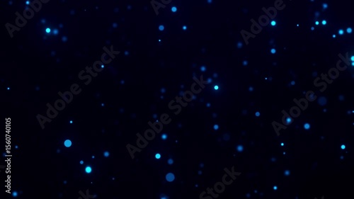 Soft glowing blue particles drifting slowly on a dark background. Calm and abstract animation suitable for ambient and space themes.