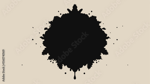Abstract black ink blot with droplet and splatter suitable for design projects