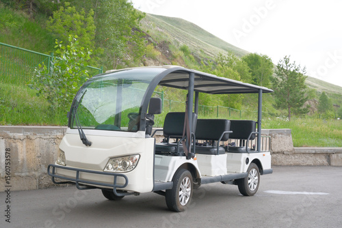 Electric Shuttle Cart in a Beautiful and Scenic Landscape Perfect for Exploring Nature