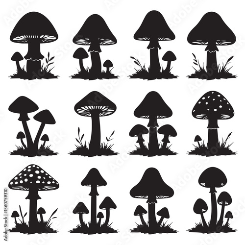 Collection of black silhouette mushrooms growing in grass on a white background