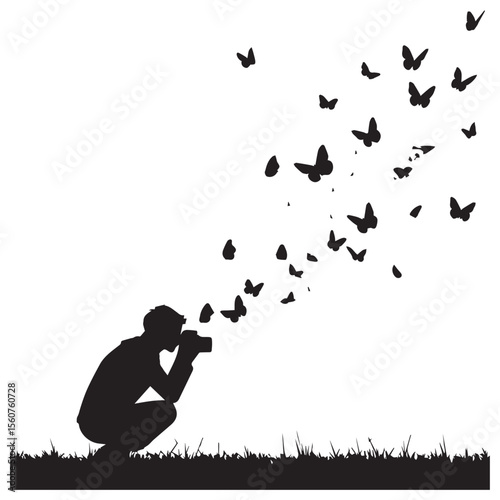 Silhouette of a photographer capturing a swarm of butterflies in flight on a grassy field