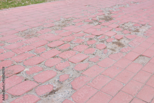Quadro su tela Damaged Red Brick Walkway Needs Immediate Repair