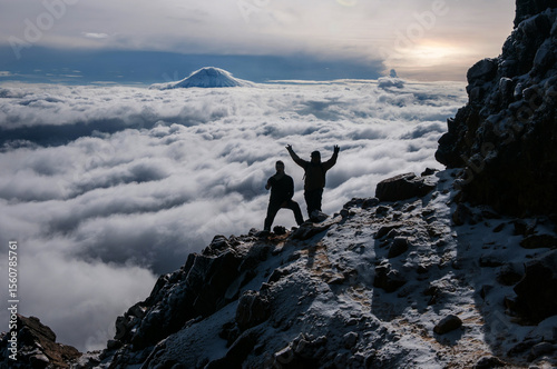 Sunrise at Illiniza Norte over the Sea of ​​Clouds and Cotopaxi in the background.