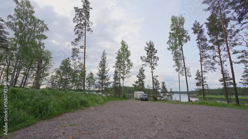 Experience the calming beauty of Finland's nature during springtime by the seaside. Lush greenery and serene waters provide a perfect backdrop for relaxation and reflection.	