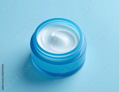 Open cosmetic cream jar top view – beauty skincare product on clean background
