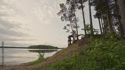 Experience the tranquil beauty of Porvoo, Finland, where calm sea waters meet lush nature. Enjoy a peaceful spring day surrounded by trees and gentle waves, perfect for relaxation.	