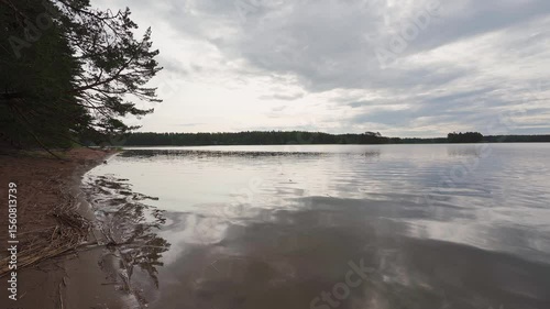 Explore the tranquil beauty of Porvoo, Finland, where the calm sea water invites relaxation. Experience the peaceful nature and refreshing ambiance in a beautiful spring setting.	