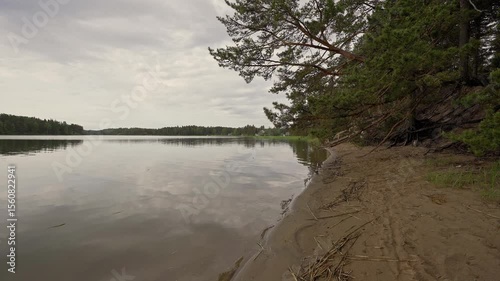 Discover serene moments by the tranquil sea in Porvoo, Finland. The relaxing atmosphere captures the beauty of nature in spring, inviting you to unwind and connect with the surroundings.	