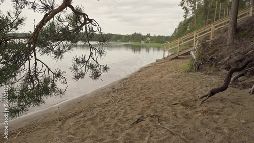Enjoy the calming atmosphere of Porvoo, Finland as you relax by the peaceful sea water. Natural beauty surrounds you on this serene spring day. The sound of gentle waves enhances the tranquility.	
