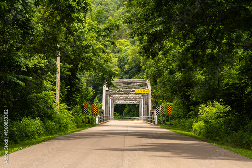 Devils Elbow, Missouri, USA - June 17th 2025 - The historic 1923 Devils Elbow Bridge over the Big Piney River on Route 66.