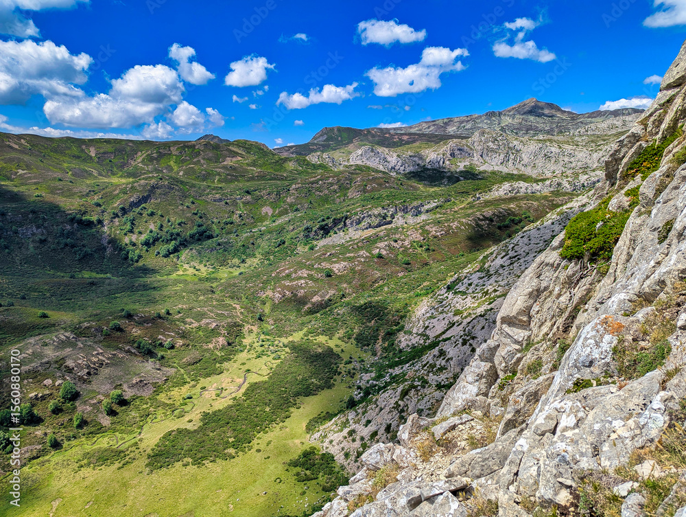 Meadows and El Cornon peak in background near Santa Maria del Puerto village, Somiedo Natural Park. Asturias. Spain Meadows and El Cornon peak in background near Santa Maria del Puerto village, Somiedo Natural Park. Asturias. Spain