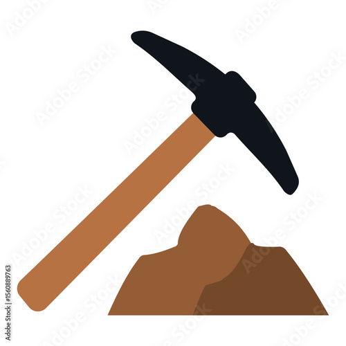 Pickaxe resting on a rock at a construction site during the day