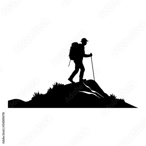 Silhouette of a Mountaineer Hiking Up a Hill with Backpack and Stick