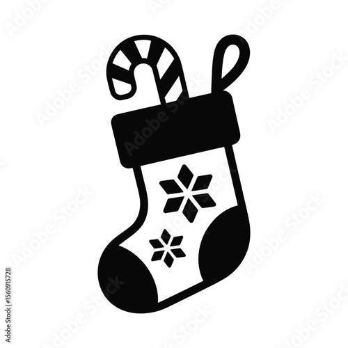 Christmas stocking with candy cane and snowflakes silhouette isolated on white background