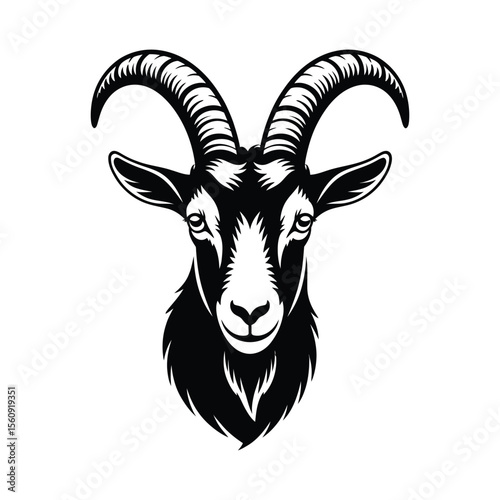 Black silhouette of a goat head with large curved horns isolated on white background