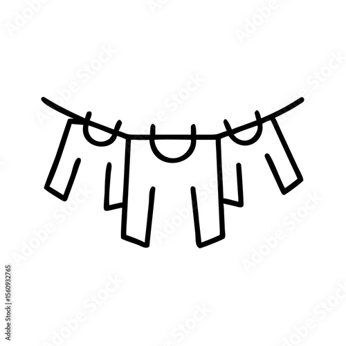 Clothes hanging on a clothesline with pegs in minimalist style  