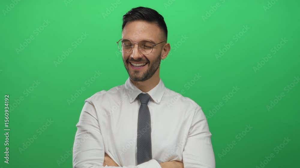 Young hispanic man smiling confidently with arms crossed against a vibrant green background wearing glasses and a formal white shirt paired with a stylish tie showcasing modern style. Young hispanic man smiling confidently with arms crossed against a vibrant green background wearing glasses and a formal white shirt paired with a stylish tie showcasing modern style.