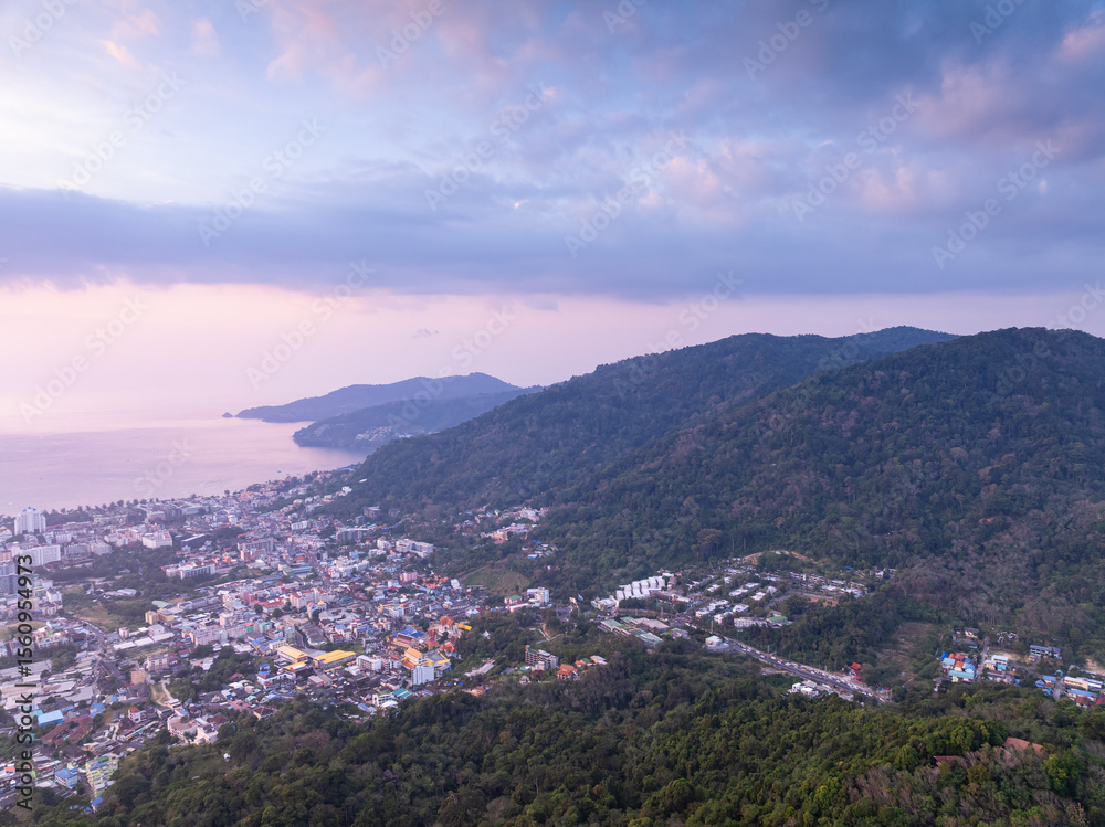 Fototapeta premium Aerial view of beautiful sunset sky over sea at Patong bay Phuket city Thailand