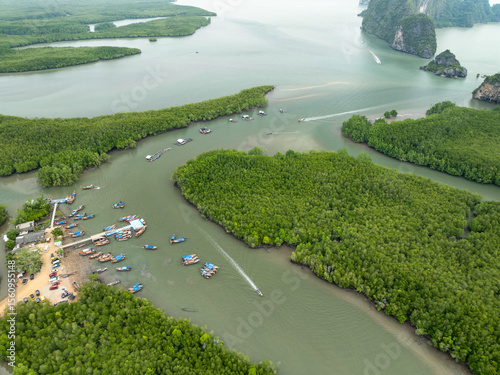Ban Hinrom pier Longtail fishing boats in the sea located at Phang Nga province Thailand photo