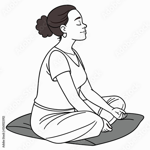 Woman meditating cross legged peaceful expression calm
