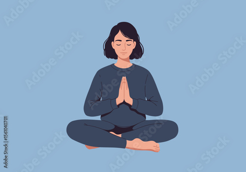 Serene Woman Meditating in Lotus Position with Hands in Prayer Pose.
