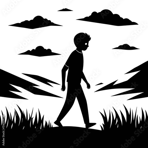  Silhouette of a person walking slowly in a field
