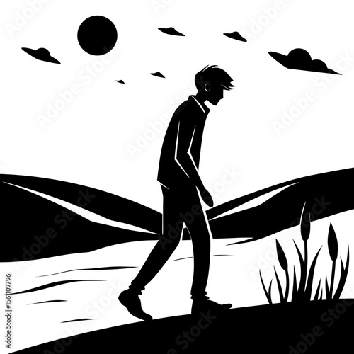  Silhouette of a person walking slowly in a field