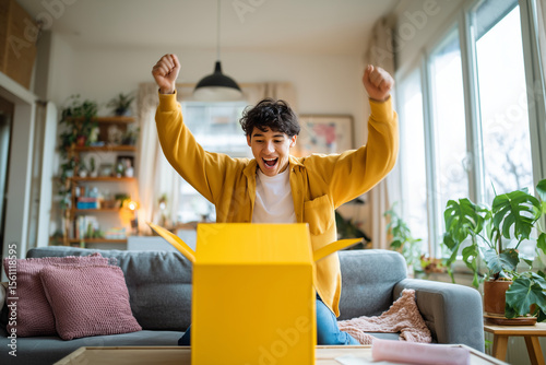 A person excitedly unboxing a package received from online shopping
