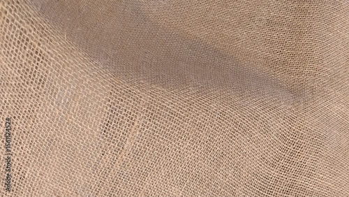 Burlap texture. Retro natural linen bag burlap beige texture background.
Brown hessian jute pattern backdrop.