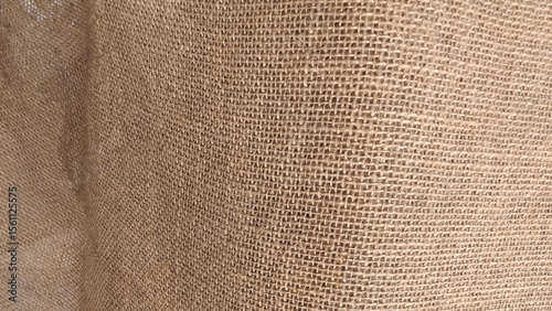 Burlap texture. Brown sackcloth textile textured background. Retro natural linen bag burlap beige texture background.
Brown hessian jute pattern backdrop.